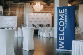 Venues Welcome sign with white table cloth dinner  tables